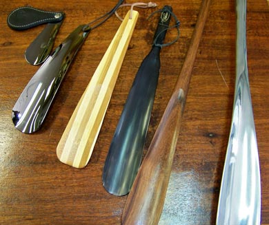 Shoe horns, wooden and metal