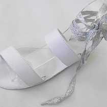 white sandal with ankle tie
